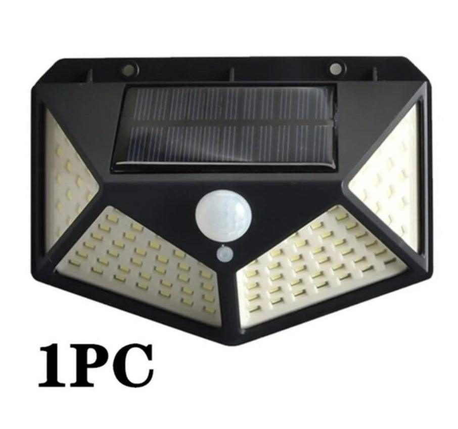 Outdoor LED Garden Solar Lamp with motion sensor, waterproof design, black finish, and energy-saving technology.