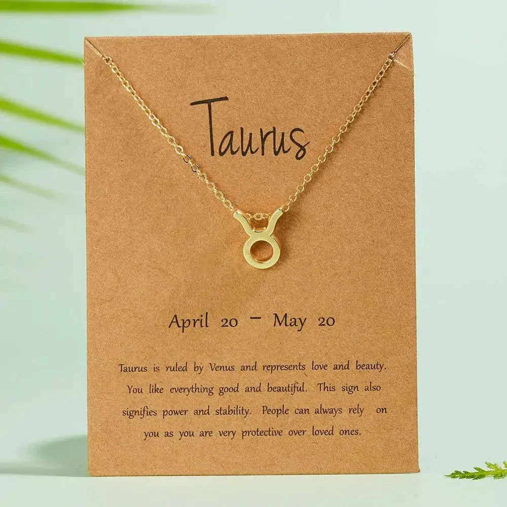  Zodiac Sign Pendant Necklace in gold with Taurus sign on a link chain.