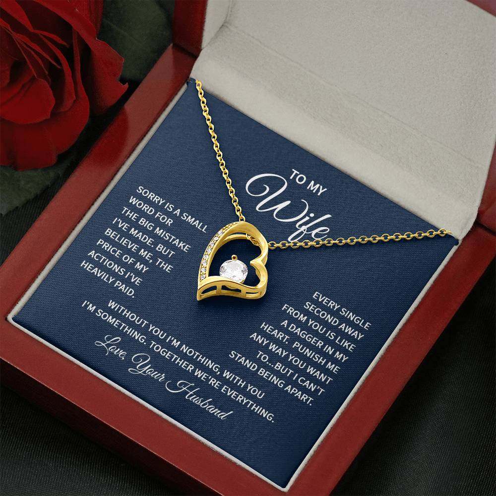 Wife heart necklace with gold finish and CZ crystal in gift box.