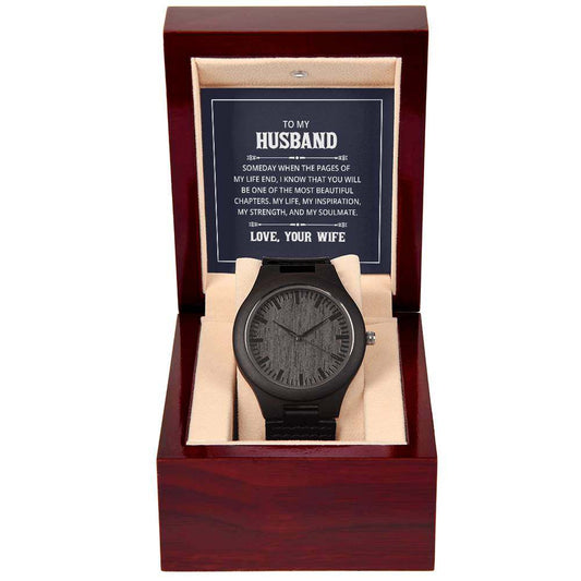 Wooden watch with sandalwood case and black leather strap in a gift box, perfect for husband.