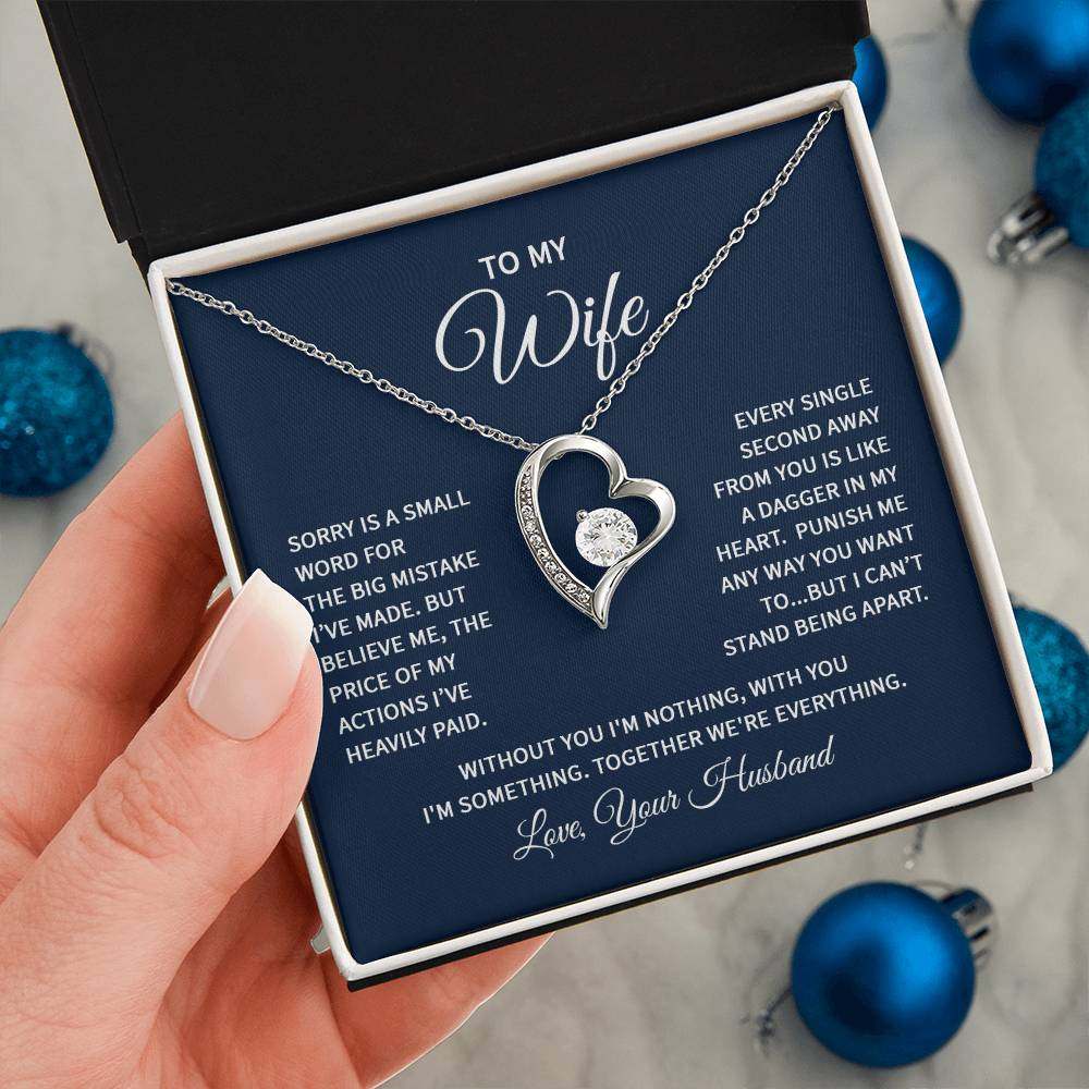 Heart-shaped necklace gift box with a message for wife featuring a sparkling CZ crystal pendant, perfect for expressing love.