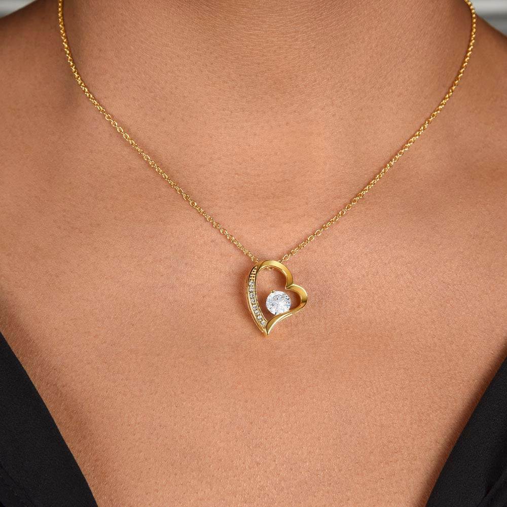 Wife heart necklace with yellow gold finish and CZ crystal pendant.